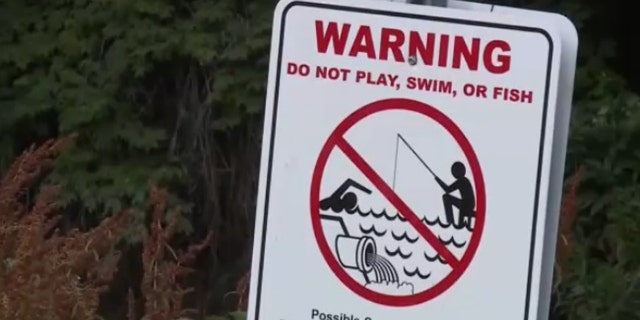 File photo of warning sign at Coldwater Creek in Missouri.