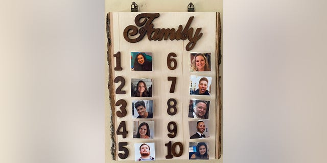 The LaMorte grandchildren are ranked by their grandmother, Mary LaMorte, from one to 10 on this ranking board that she keeps on a wall of her home.