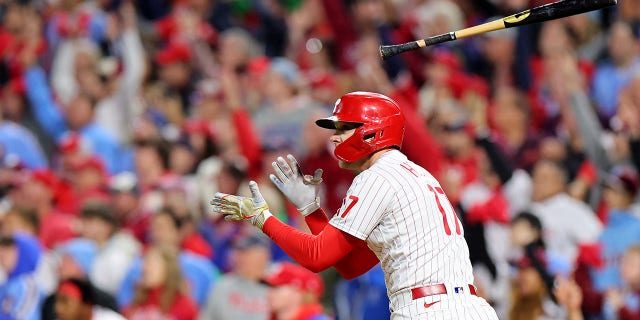 Rhys Hoskins #17 of the Philadelphia Phillies reacts after his two-run home run against the San Diego Padres during the fifth inning in game four of the National League Championship Series at Citizens Bank Park on October 22, 2022 in Philadelphia, Pennsylvania.