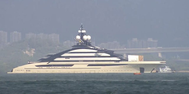 In this image taken from a video footage run by TVB, the megayacht Nord, worth over $500 million, is seen off Hong Kong Island outside Victoria Harbour on Friday, Oct. 7, 2022.