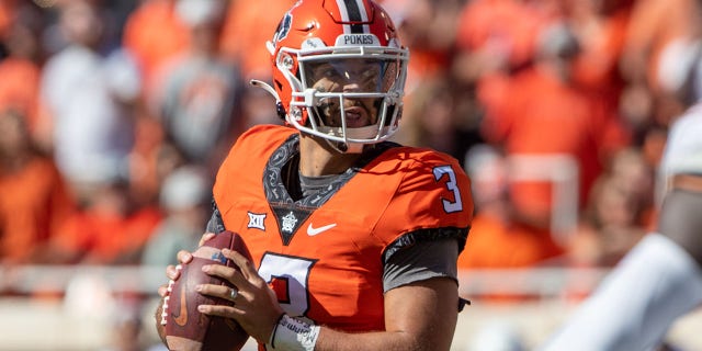 Oklahoma State Cowboys quarterback Spencer Sanders (3) looks to pass during the first half against the Texas Longhorns on Oct. 22, 2022, at Boone Pickens Stadium in Stillwater, Oklahoma.