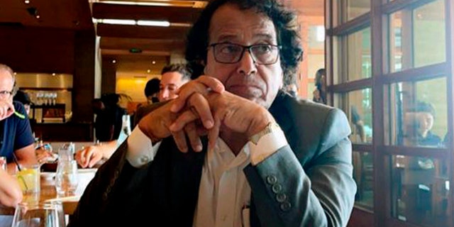Saad Ibrahim Almadi sits in a restaurant in an unidentified place, in the United States, on August 2021. (Ibrahim Almadi via AP)