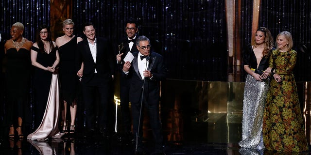 Eugene Levy, center, and the cast of "Schitt's Creek" accept the award for best comedy series at the 7th annual Canadian Screen Awards in Toronto March 31, 2019.