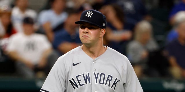 Scott Effross of the New York Yankees reacts as the Yankees play the Texas Rangers on Oct. 3, 2022, in Arlington, Texas.
