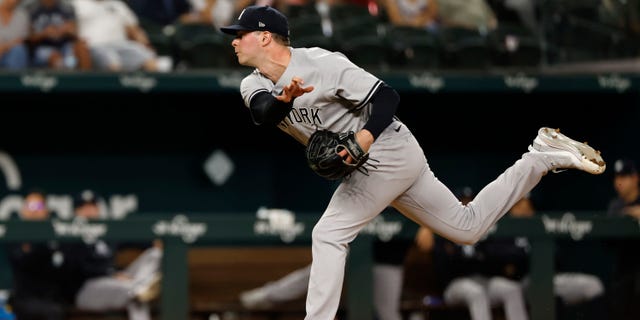 Scott Effross of the New York Yankees throws a pitch against the Texas Rangers on Oct. 3, 2022, in Arlington, Texas.