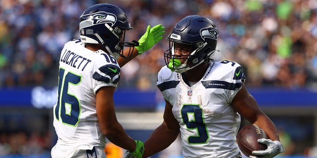 Tyler Rocket #16 of the Seattle Seahawks celebrates with Kenneth Walker III #9 after scoring a touchdown in the first quarter of a game against the Los Angeles Chargers at SoFi Stadium in Inglewood, Calif., October 23, 2022. increase. 