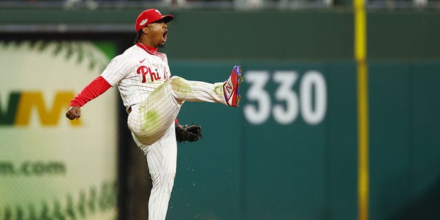 Gene Segura #2 of the Philadelphia Phillies celebrated after making a diving stop during the seventh inning of Game 3 of the National League Championship Series at the Citizens, throwing Ha Sung Kim #7 (not pictured) of the San Diego Padres at first base. I'm here.  Bank Park in Philadelphia, Pennsylvania on October 21, 2022.