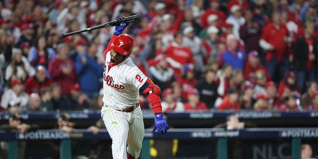 Jean Segura #2 of the Philadelphia Phillies celebrates after hitting a two-run RBI single during the fourth inning against the San Diego Padres in game three of the National League Championship Series at Citizens Bank Park on October 21, 2022 in Philadelphia, Pennsylvania.