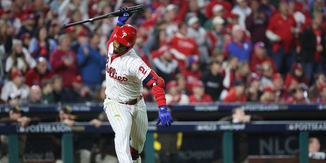 Jean Segura #2 of the Philadelphia Phillies makes two runs in the fourth inning against the San Diego Padres in Game 3 of the National League Championship Series at Citizens Bank Park in Philadelphia, Pennsylvania on October 21, 2022. Celebrating after hitting an RBI single.