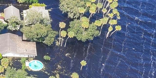 In this photo taken on Oct. 4, flooding in Seminole County leaves a home underwater.