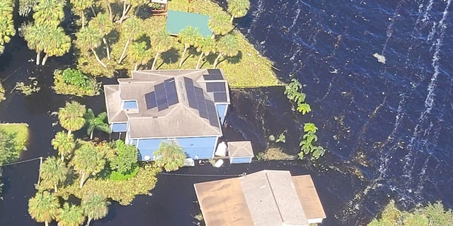 In this Oct. 4 photo, homes are inundated with floodwater in Seminole County, Florida.
