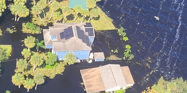 In this Oct. 4 photo, homes are inundated with floodwater in Seminole County, Florida.