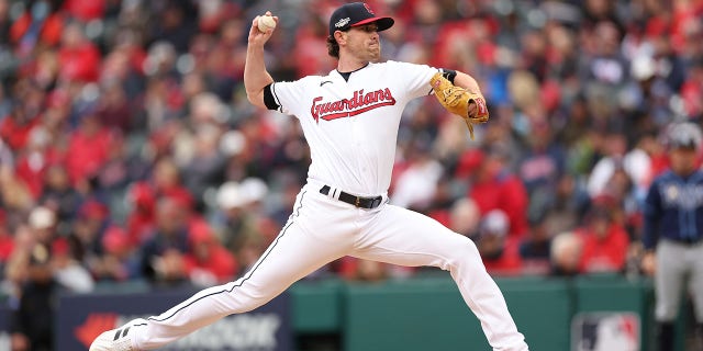 Shane Bieber throws pitch