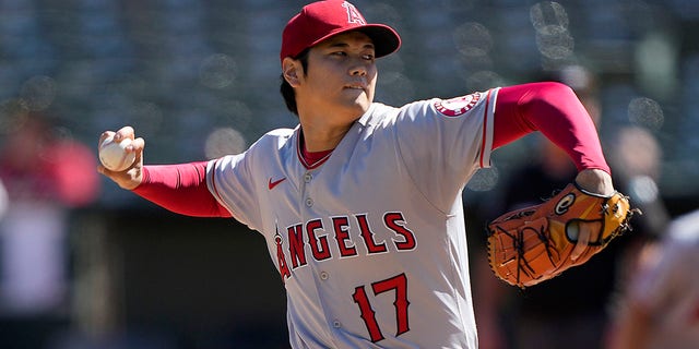 Shohei Ohtani of the Los Angeles Angels pitches against the Oakland Athletics at RingCentral Coliseum Oct. 5, 2022, in Oakland, Calif.