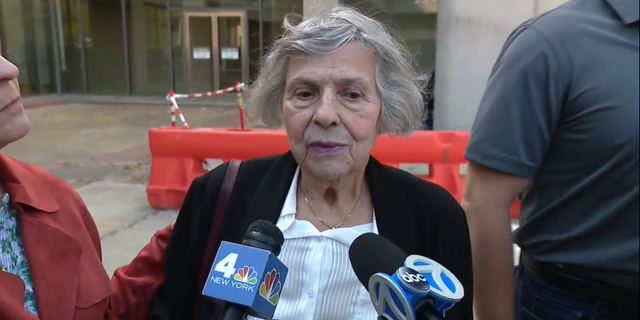 Larchmont Patrolman Arthur Dematte's widow, Alice, speaks to reporters on the 46th anniversary of her husband's murder.