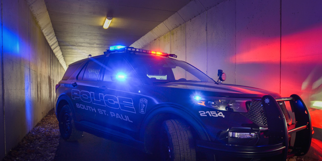 South St. Paul Police Department vehicle with lights on. 