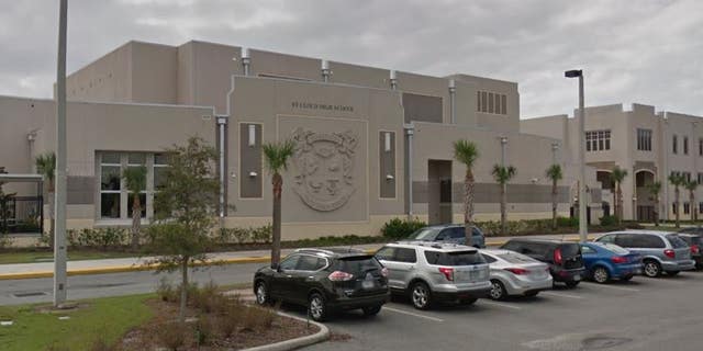 A Google Earth image shows the exterior of St. Cloud High School in Florida.