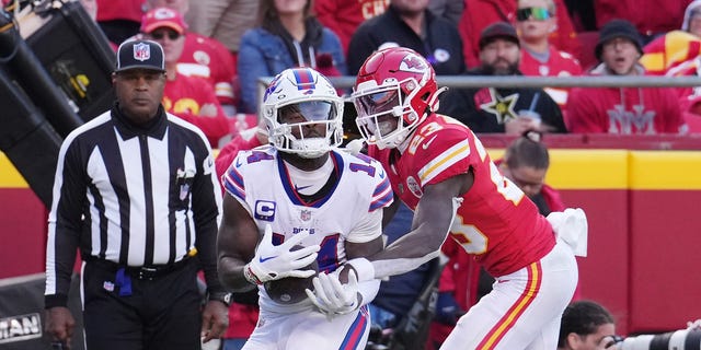 Stefon Diggs (14) of the Buffalo Bills makes a catch for a touchdown during the third quarter against the Kansas City Chiefs on Oct. 16, 2022, in Kansas City, Missouri.