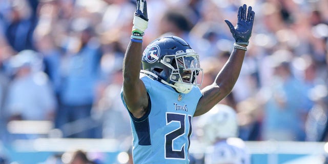 Roger McCreary #21 of the Tennessee Titans celebrates after an interception against the Indianapolis Colts was returned for a touchdown during the first half at Nissan Stadium on October 23, 2022, in Nashville, Tennessee.