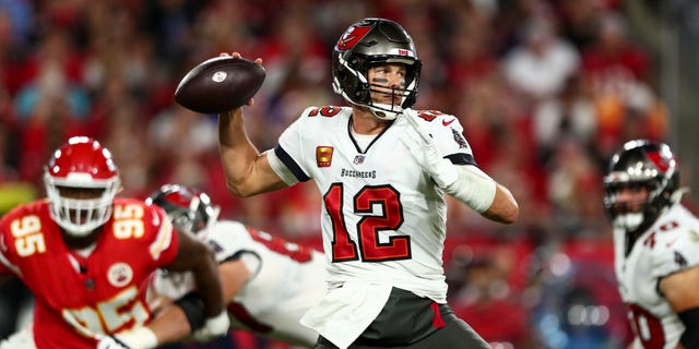 Tom Brady #12 of the Tampa Bay Buccaneers throws a pass during an NFL football game against the Kansas City Chiefs at Raymond James Stadium in Tampa, Florida on October 2, 2022.