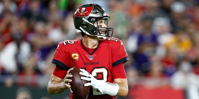 Tom Brady of the Buccaneers looks to pass against the Baltimore Ravens at Raymond James Stadium on Oct. 27, 2022, in Tampa, Florida.