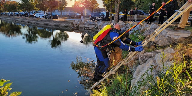 Police said that the man jumped over a railing into a pond and drowned.