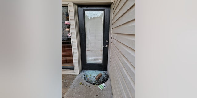 Officers responded to an alarm and found a shattered front door at Shoreline Apartments in Tulsa, Oklahoma.