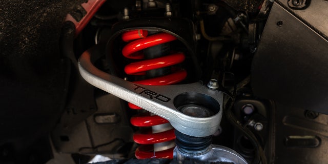The kit includes new control arms, shocks and other equipment.