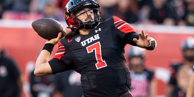 Cameron Rising #7 of the Utah Utes throws a pass against the USC Trojans during the first half of their game October 15, 2022 Rice-Eccles Stadium in Salt Lake City Utah.