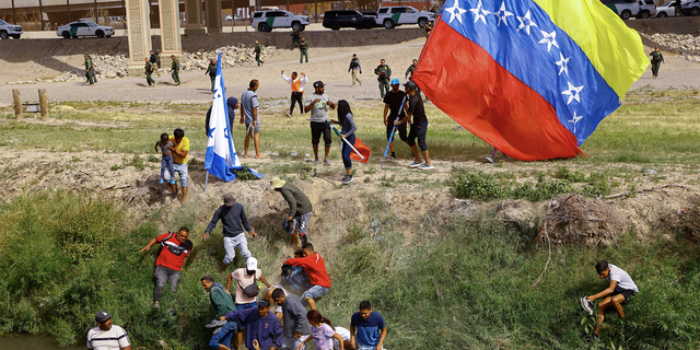 Venezuelan migrants returning to Mexico down the Rio Grande after crossing into the United States illegally on October 31, 2022. 