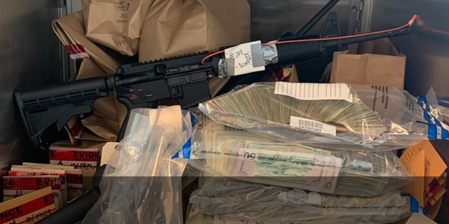 Authorities seized three rifles and $420,761 in cash across multiple locations in Washington, Clackamas and Multnomah Counties.