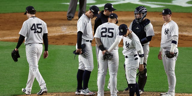 Gerrit Cole #45 of the New York Yankees leaves the game against the Houston Astros after being pulled by manager Aaron Boone #17 during the sixth inning in game three of the American League Championship Series at Yankee Stadium on Oct. 22, 2022, in New York City.