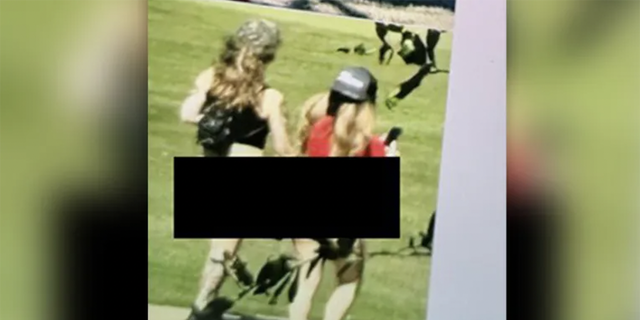 Photos acquired by G3 Box News 7 Austin appear to show two women from an adult entertainment club walking on the course. 