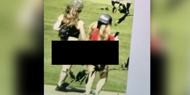 Photos acquired by G3 Box News 7 Austin appear to show two women from an adult entertainment club walking on the course.