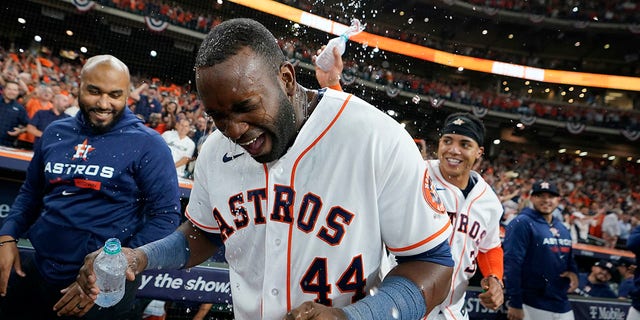 Houston Astros designated hitter Yordan Alvarez (44) celebrates with teammates after his three-run, walkoff home run against the Seattle Mariners during the ninth inning in Game 1 of an American League Division Series baseball game in Houston, Tuesday, Oct. 11, 2022.