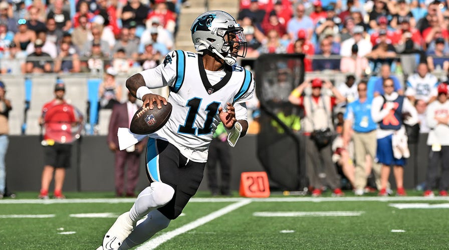 Carolina Panthers quarterback P.J. Walker (6) runs off the field