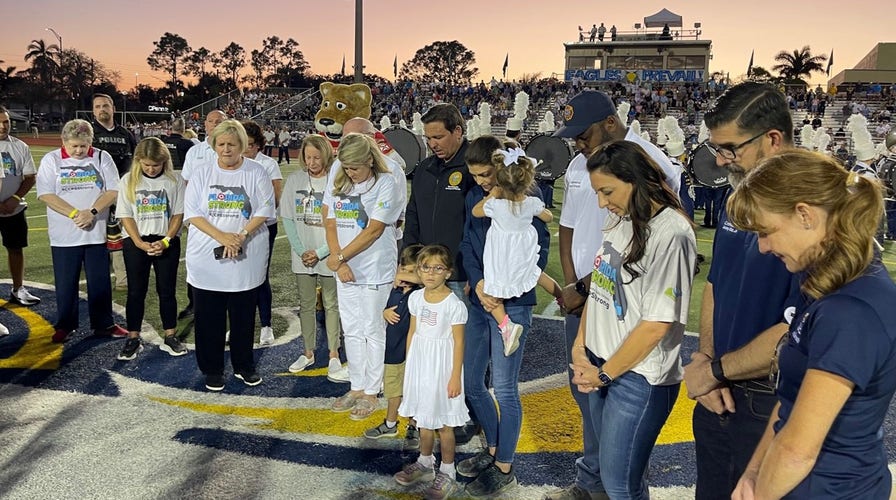 Florida Gov. Ron DeSantis attends high school football days after Hurricane Ian