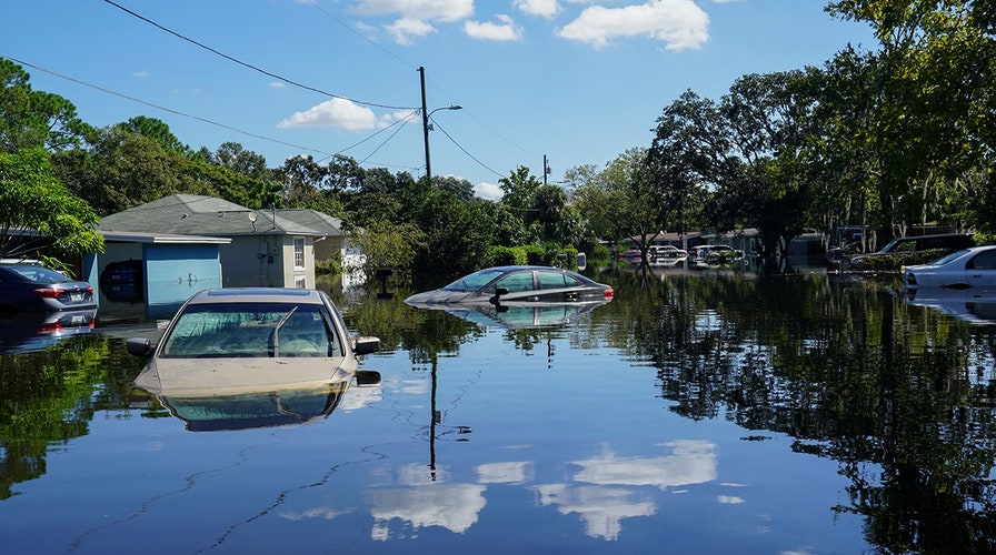 McLaren sports car in Florida seen floating in Hurricane Ian floodwaters