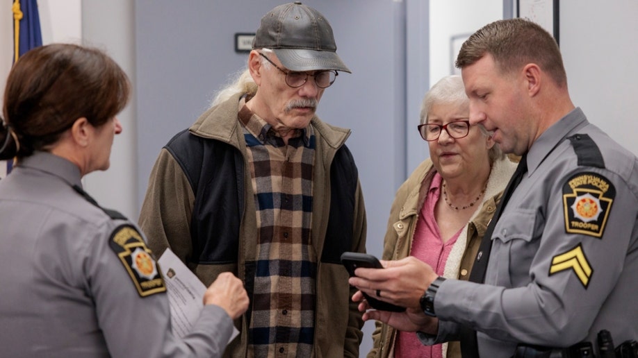 Joan Marie Dymond's relatives at a press conference