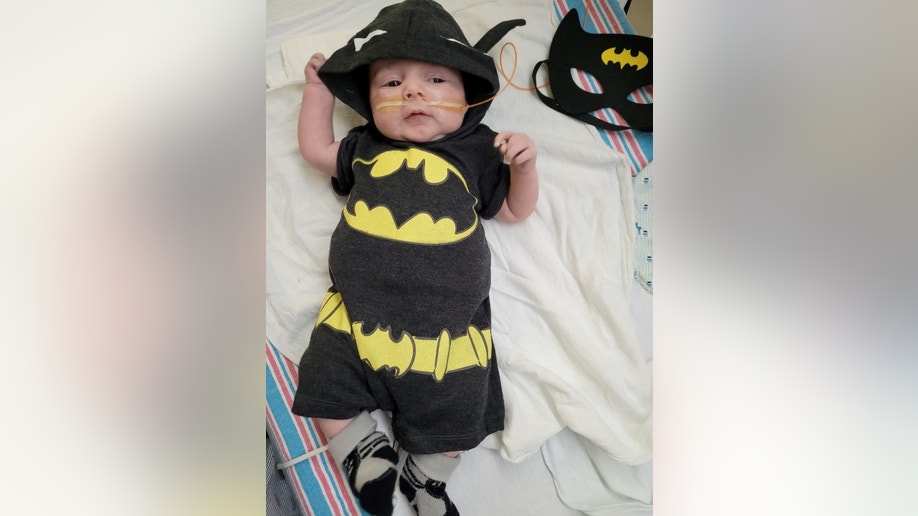 Toddler patient dressed as Batman