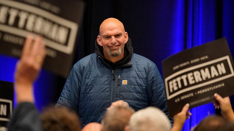 A photo of John Fetterman in front of supporters