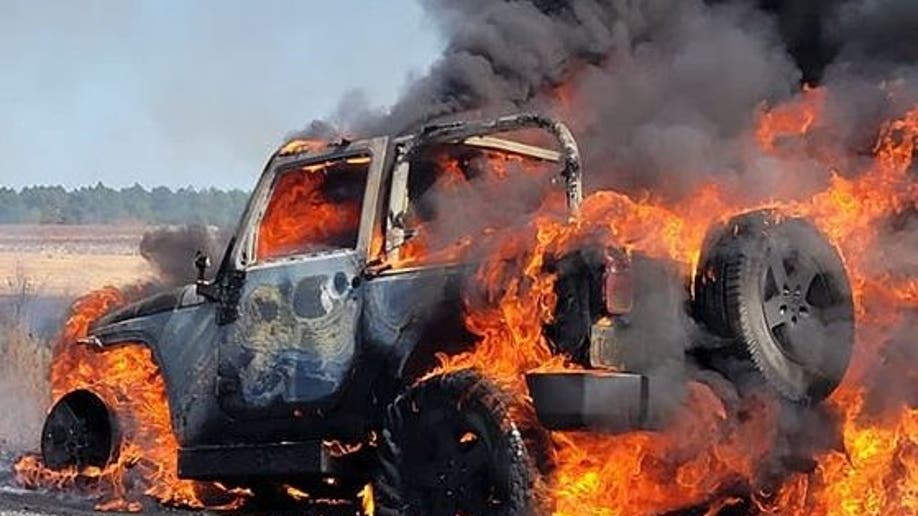 U.S. mail truck engulfed in flames
