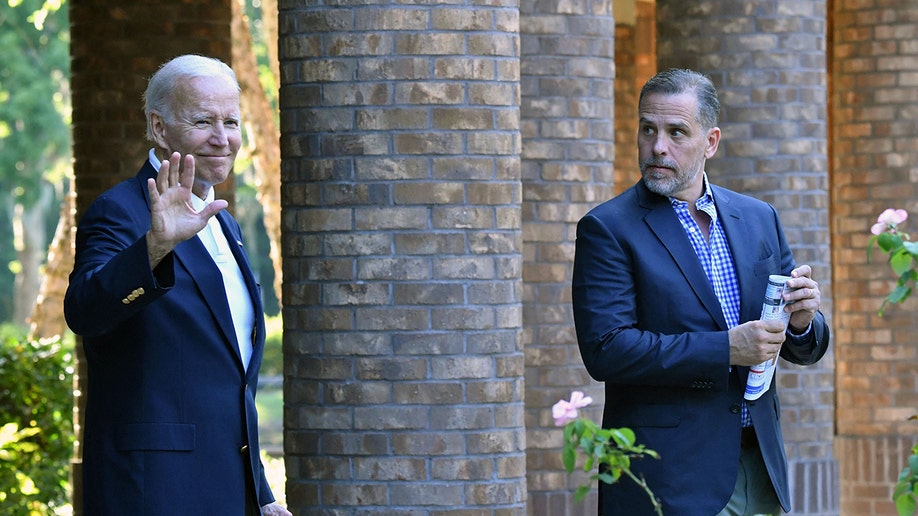 Joe Biden waving with his son, Hunter Biden