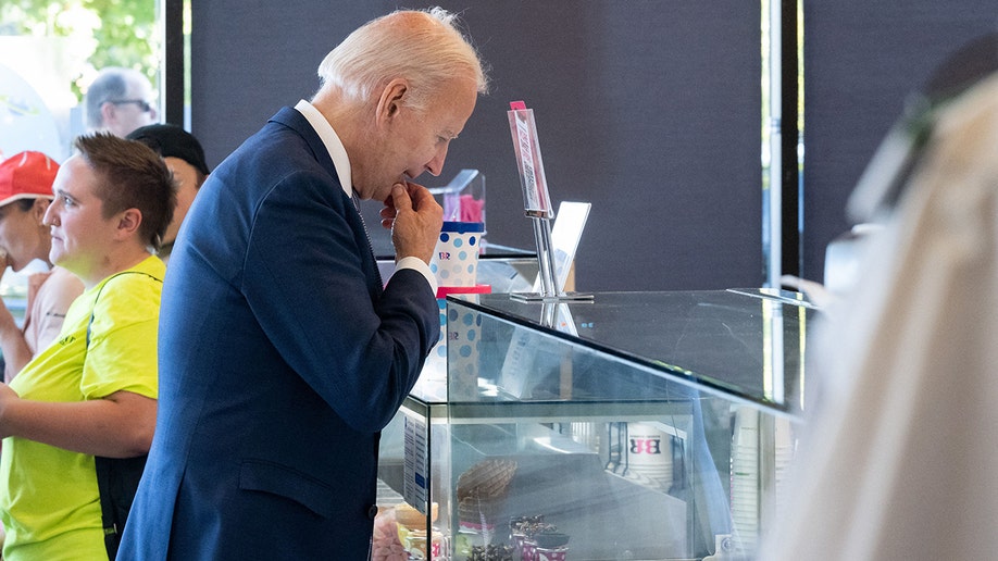 Biden standing in a ice cream shop