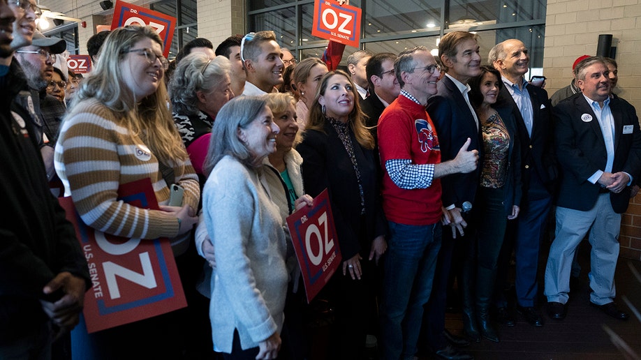 A photo of Dr. Oz with supporters