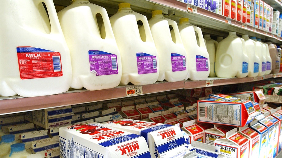 Milk cartons arranged at a store