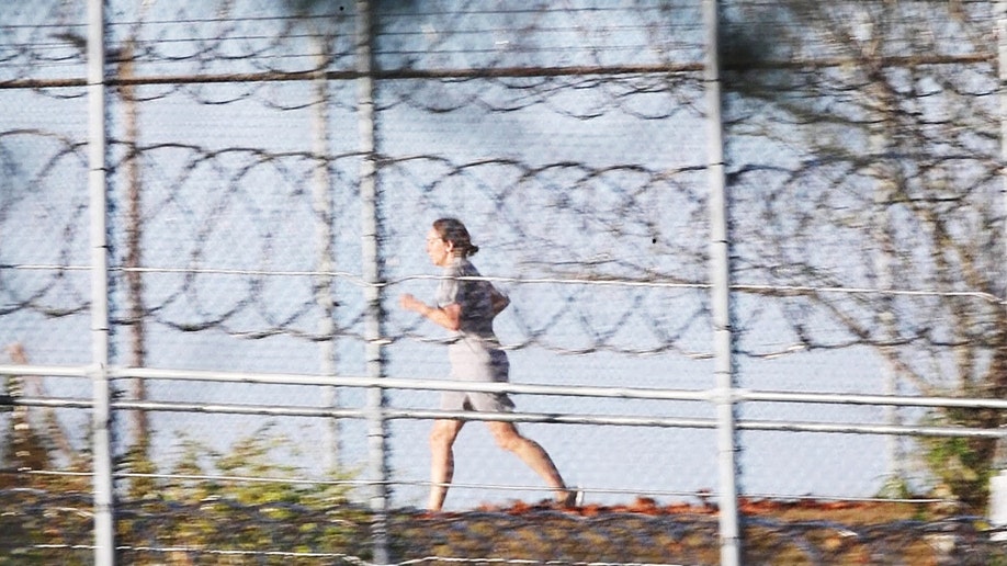 Ghislaine Maxwell jogs outside Florida prison
