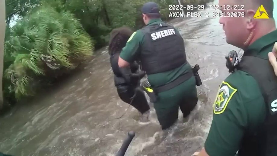 Police rescue woman from flooding