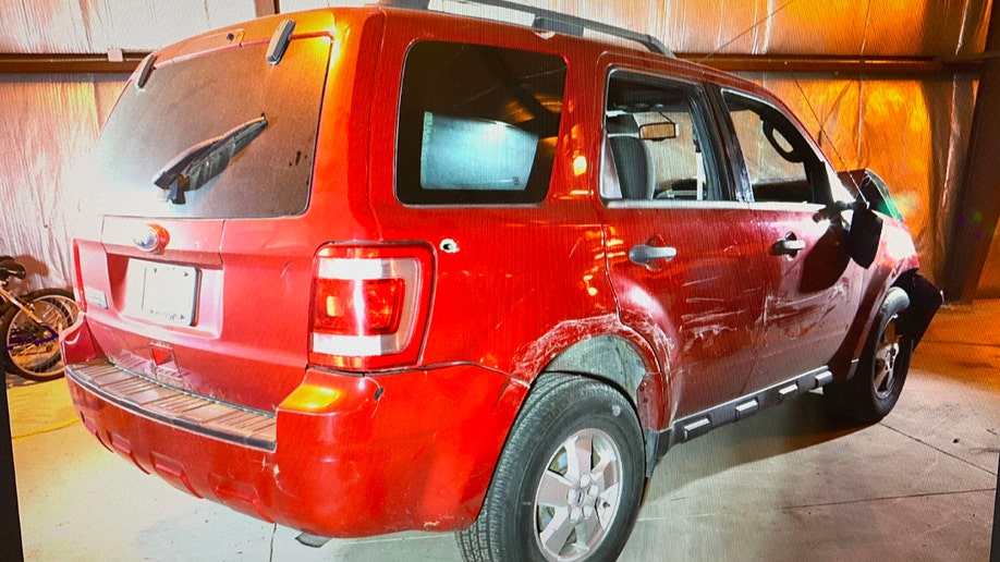 Damage to Darrell Brooks' red SUV