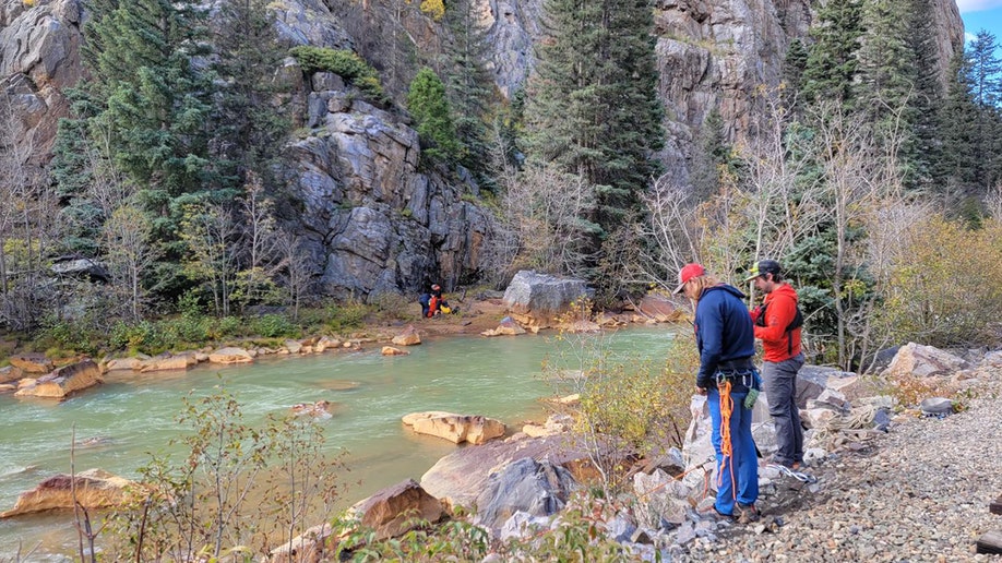 rescuers along Animas River